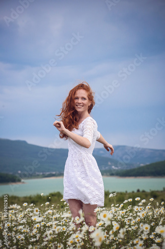 Beautiful woman enjoying field, harmony concept