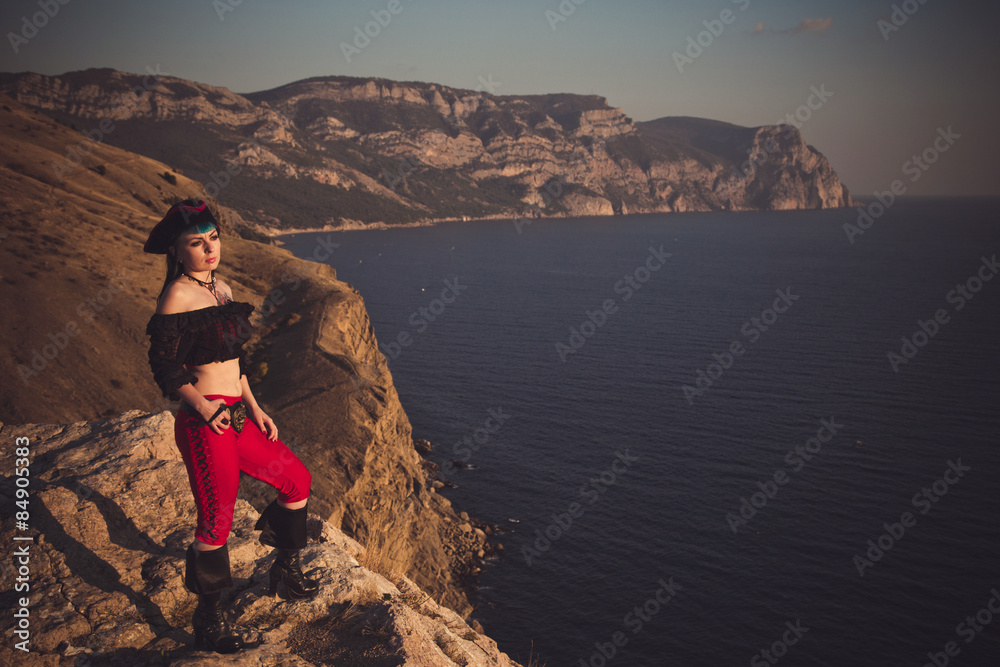 Fototapeta premium Portrait of a pirate woman at the beach