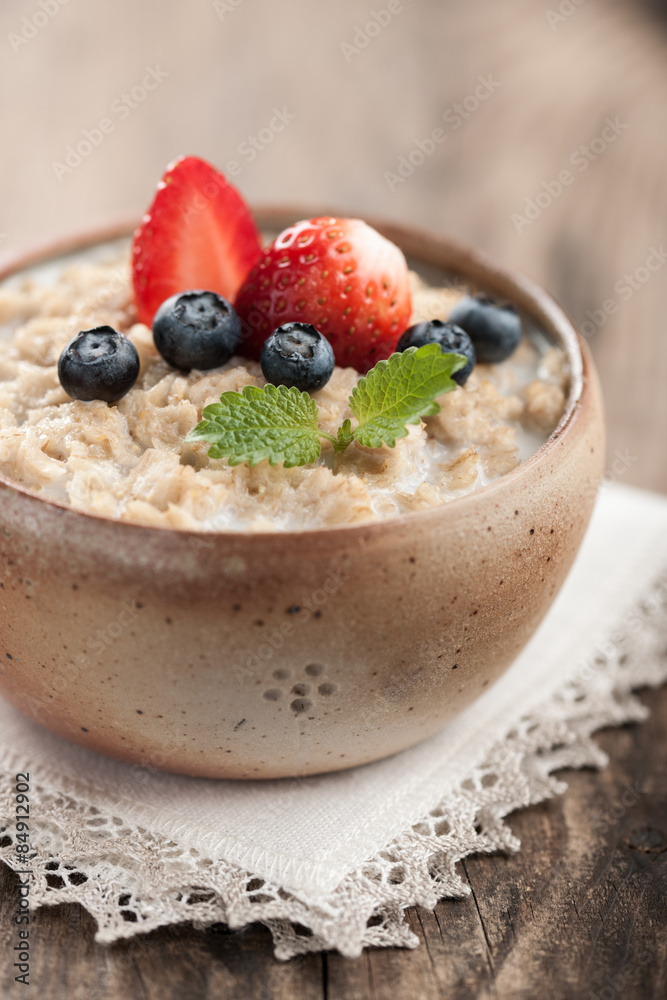 Breakfast oatmeal with milk and berries Breakfast oatmeal with milk and berries