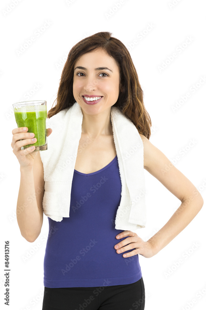 Fit happy young woman with a glass of green smoothie Fit happy young woman with a glass of green smoothie