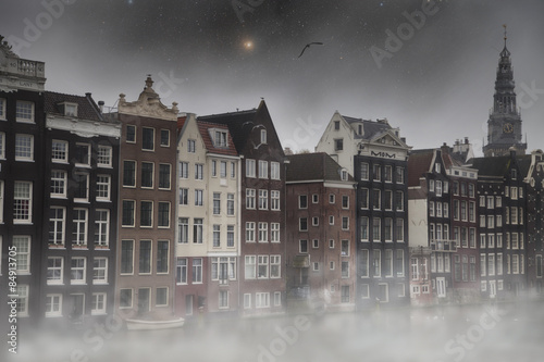mystical fog in Amsterdam at night by the light of stars.