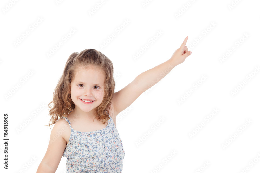 Happy little girl indicating something with the finger Happy little girl indicating something with the finger