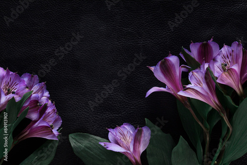 black background decorated with pink flowers
