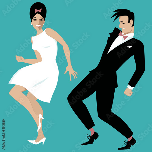 Young couple dressed in early 1960s fashion dancing rock and roll