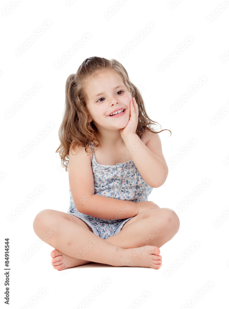Pensive little girl with three year old sitting on the floor Pensive little girl with three year old sitting on the floor