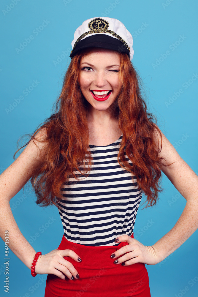 Adorable model wearing sea admirals hat and sexy top Adorable model wearing sea admirals hat and sexy top