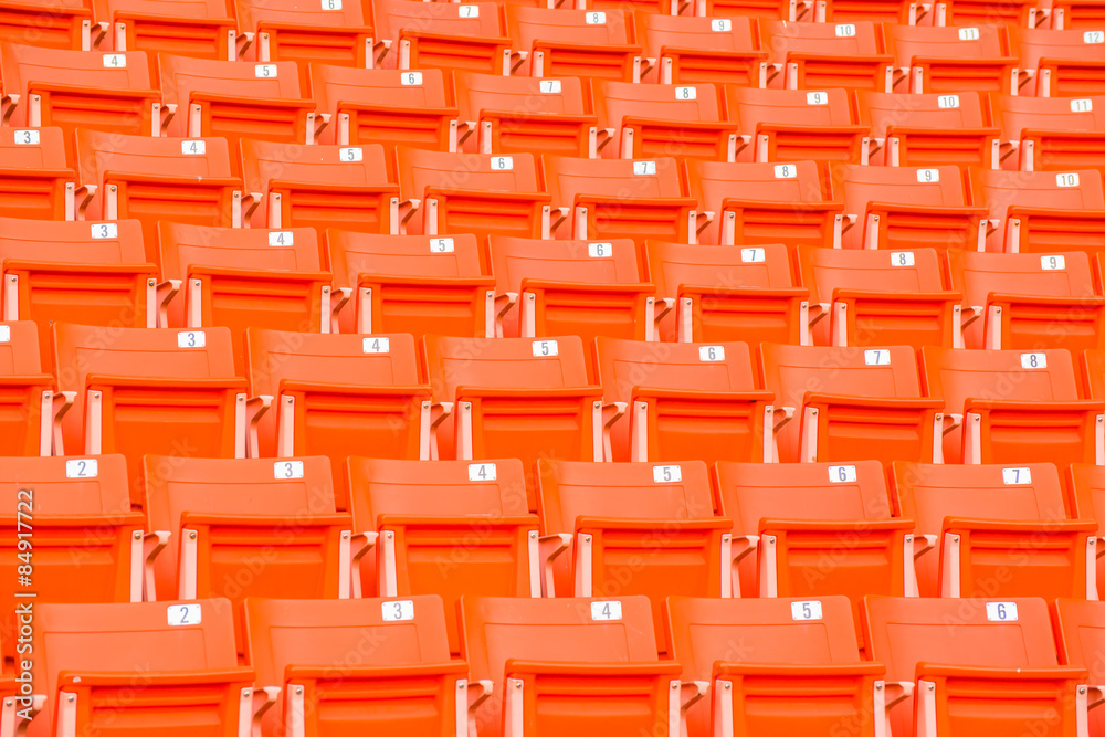 Fototapeta premium stadium, red seats on stadium steps bleacher 