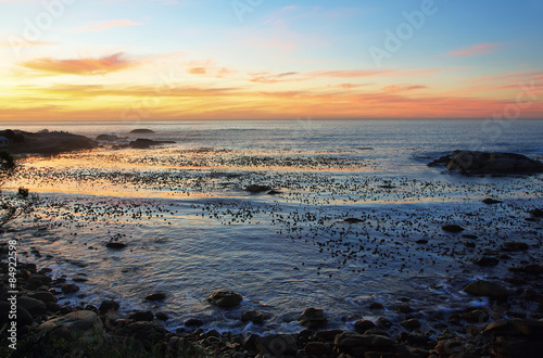 Sunset in idyllic beach near Camps bay