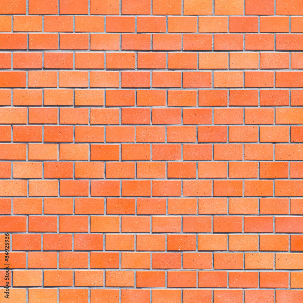 Red brick stone wall seamless background and texture