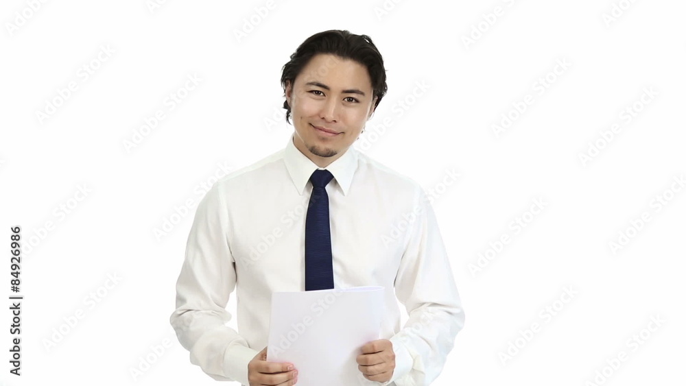 A good looking businessman in a shirt holding a folder A good looking businessman in a shirt holding a folder