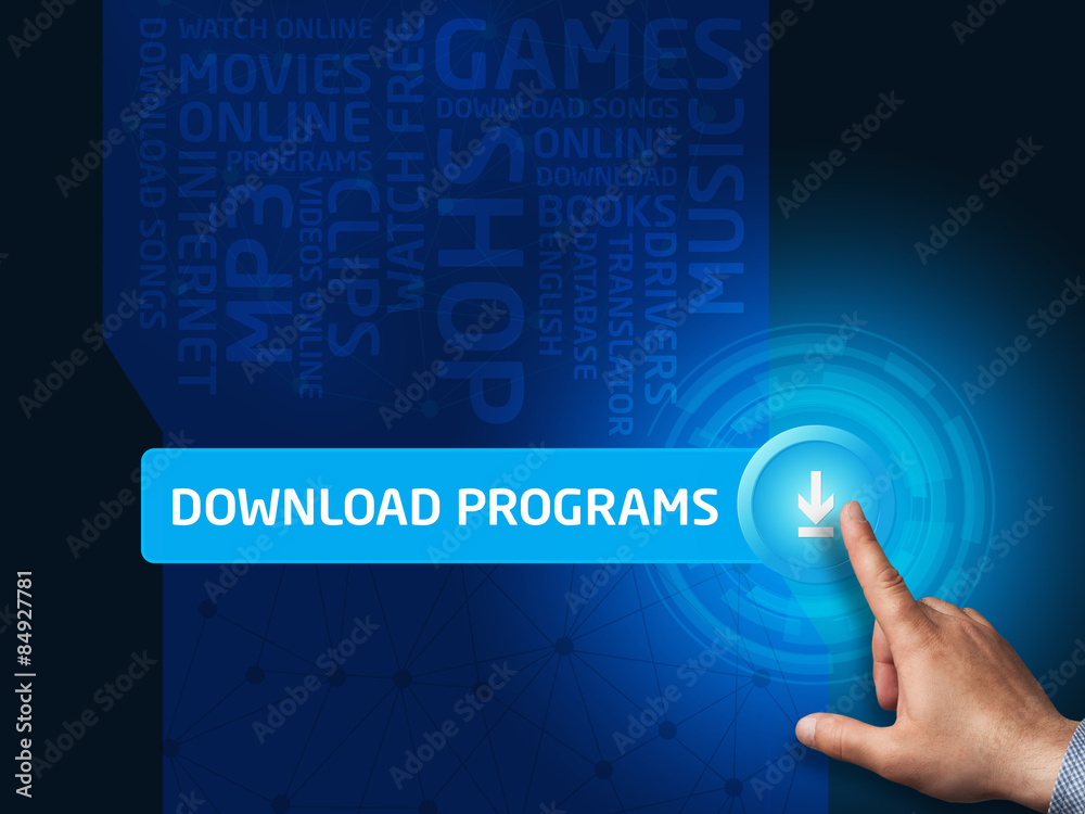Download programs.Businessman presses a button on the virtual sc Download programs.Businessman presses a button on the virtual sc