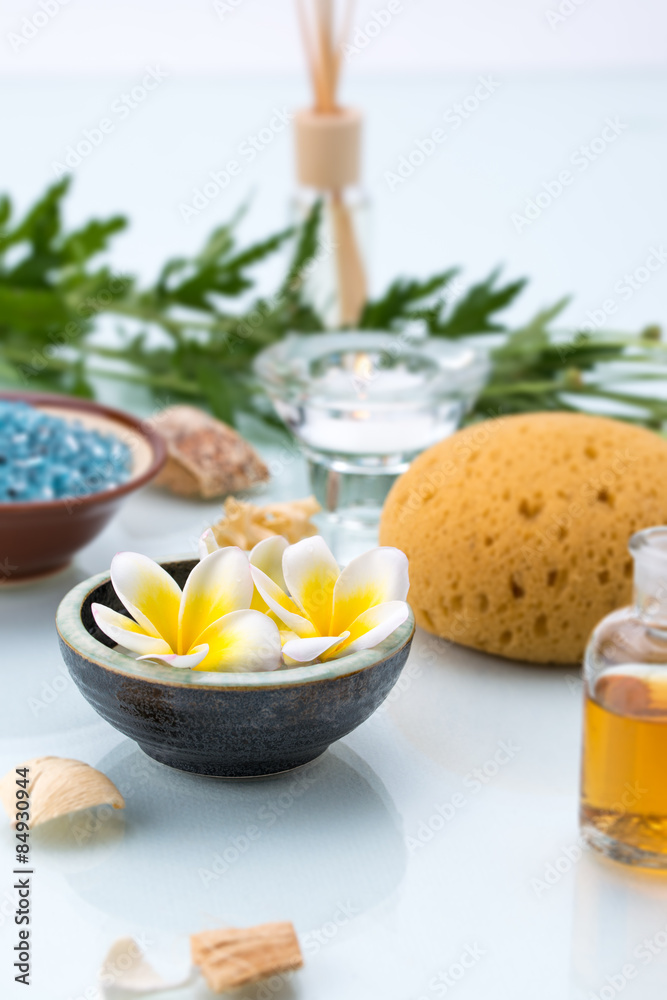 Spa concept with Floating Flowers, Sponge, essential oil
