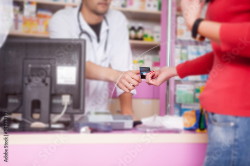 Business relations in pharmacy paying with credit card