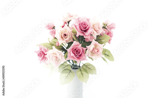 artificial pink roses bouquet in ceramic vase, high key style