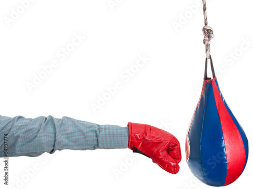 manager with boxing glove punches punching bag