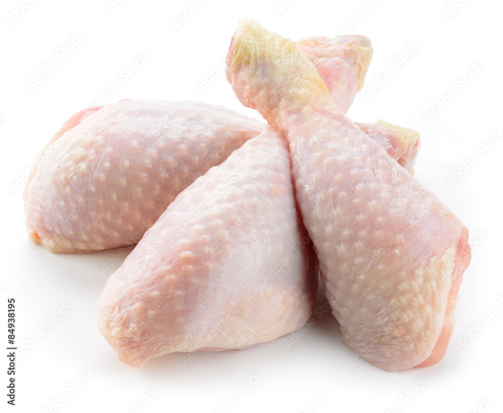 Raw chicken legs isolated on a white background
