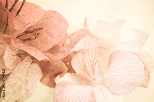 Sweet flowers on mulberry paper texture
