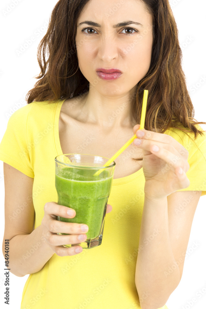 Woman makes a sour face for the smoothie