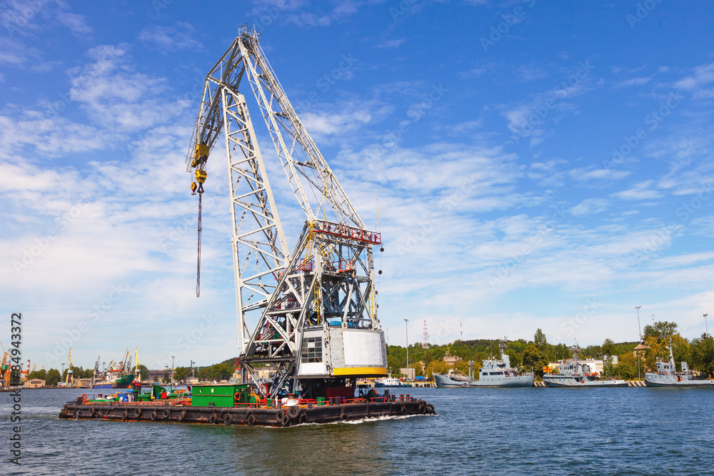 Huge floating crane at work in port of Gdynia, Poland.