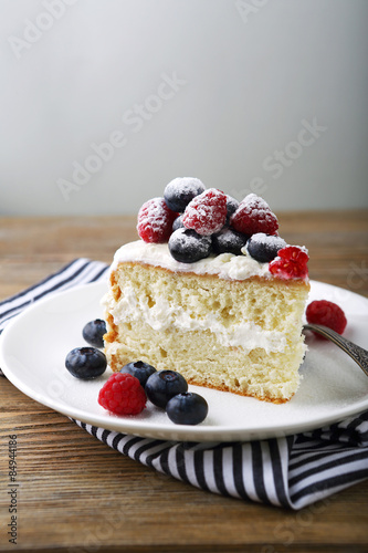 Delicious cake with raspberries and blueberries