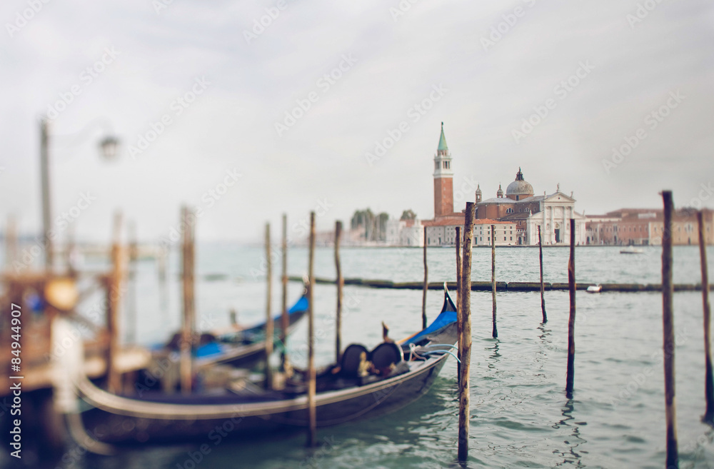 Tilt shift photo of view of Santa Maria Maggiore island with gondola