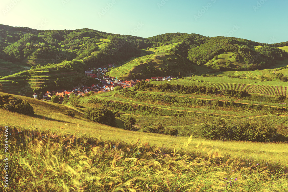Beautiful scenic mountain landscape with an old town in Germany, Black forest, Kaiserstuhl. Travel background.