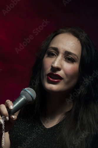 Beautiful female singer in studio © ansaharju
