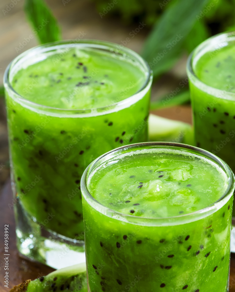 Fresh juice with pulp kiwi, selective focus Fresh juice with pulp kiwi, selective focus