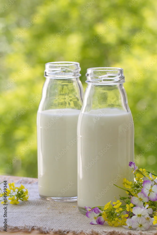 Bottle of milk in summer time Bottle of milk in summer time