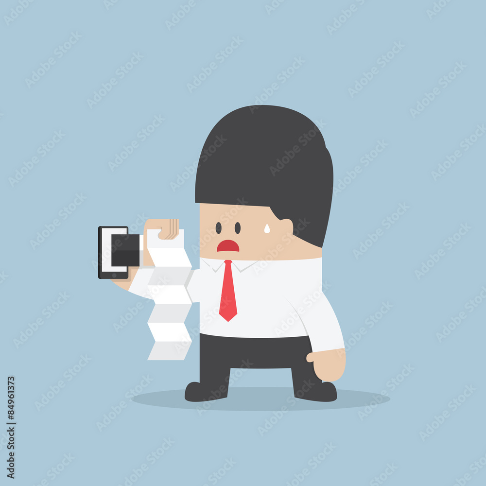 Businessman was shocked by seeing the bill from smartphone Businessman was shocked by seeing the bill from smartphone