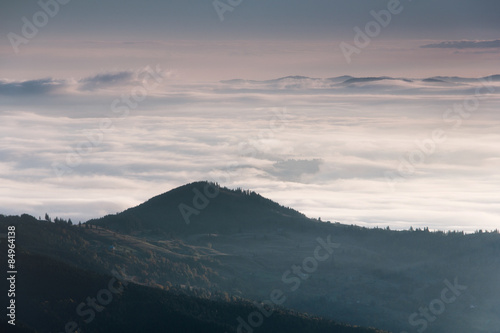 Landscape misty mountains in the morning sunlight. © vovik_mar