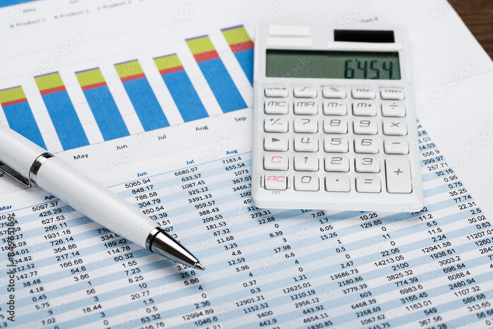 Financial Data Sheet With Calculator And Pen Financial Data Sheet With Calculator And Pen