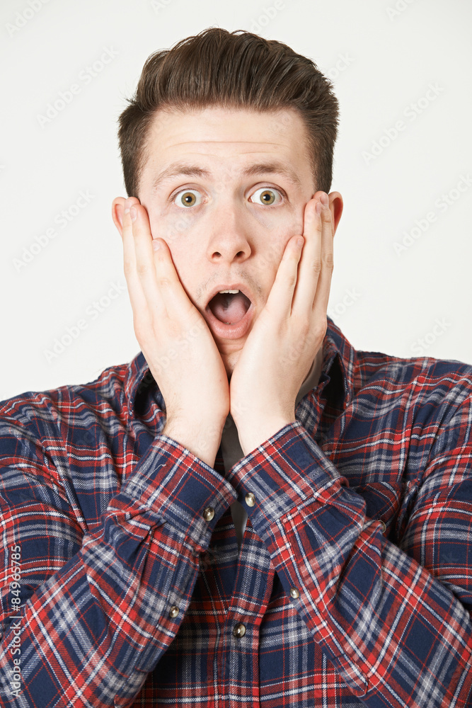 Studio Portrait Of Man With Shocked Expression Studio Portrait Of Man With Shocked Expression