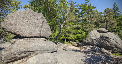 Rock formation in forest, Sokole mountains, Poland. photo