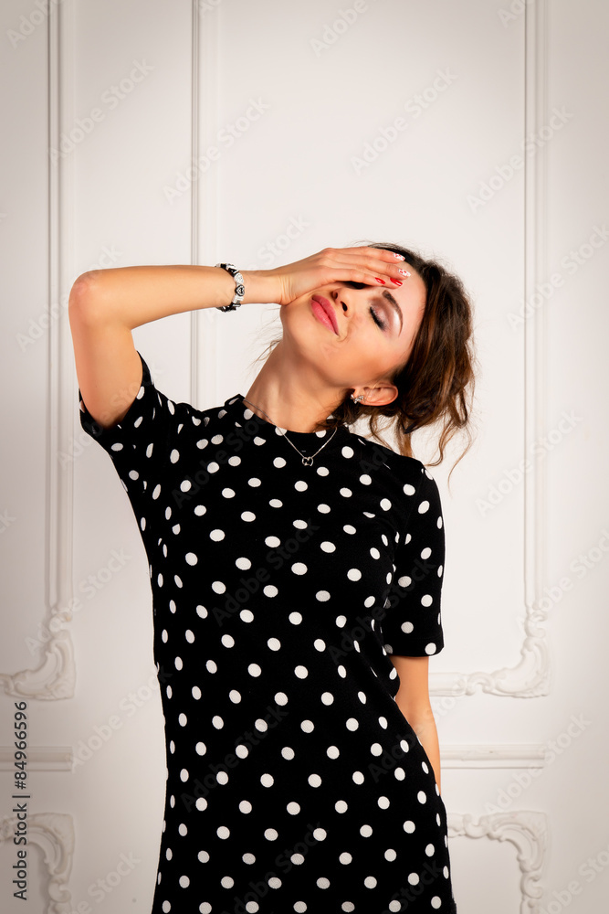 Portrait of a smiling sexy woman in a black dress Portrait of a smiling sexy woman in a black dress
