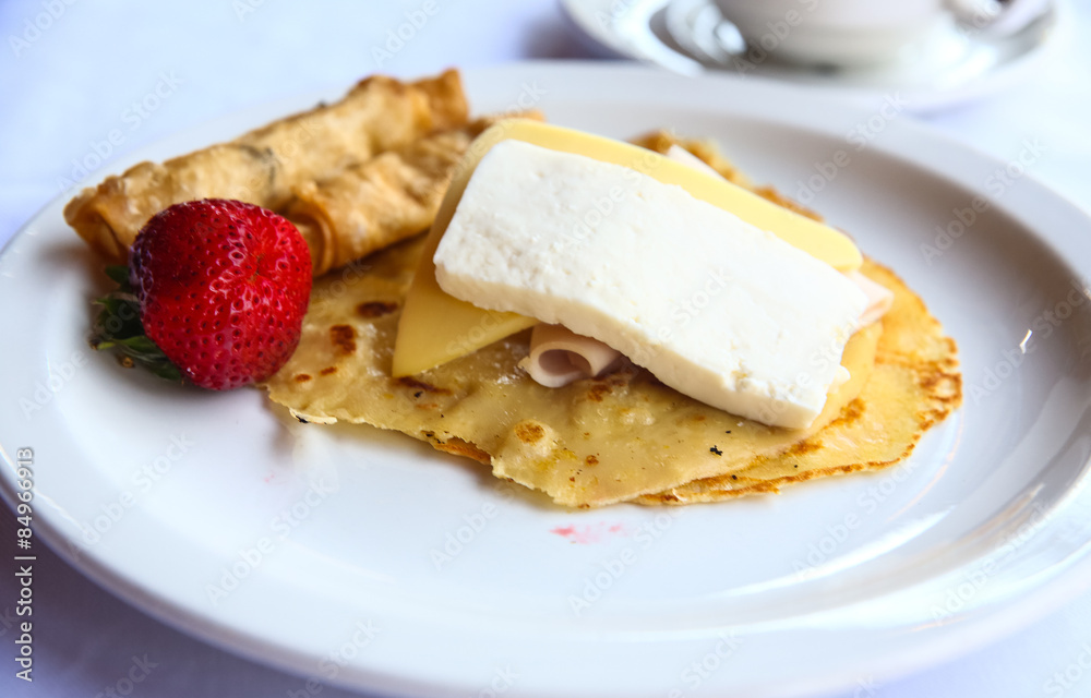 Pancake with cheese and ham Pancake with cheese and ham