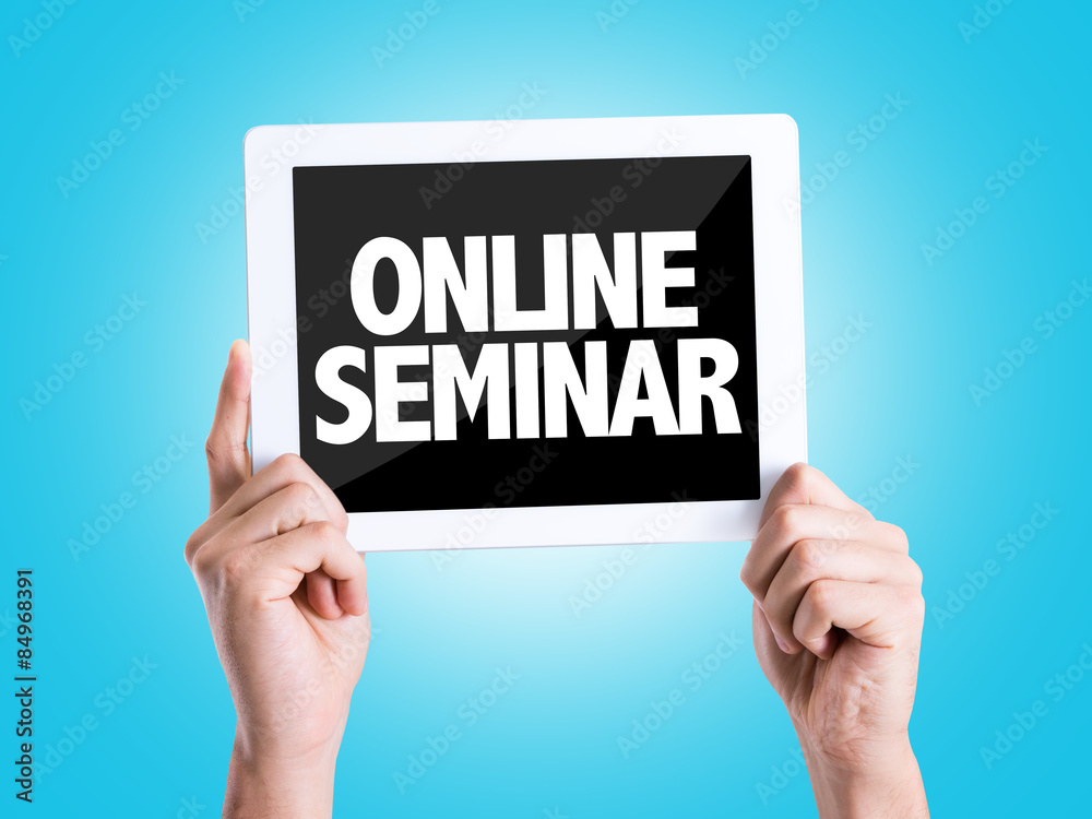 Tablet pc with text Online Seminar with blue background Tablet pc with text Online Seminar with blue background