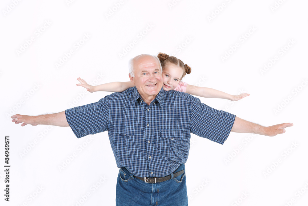Grandfather having fun with his granddaughter Grandfather having fun with his granddaughter