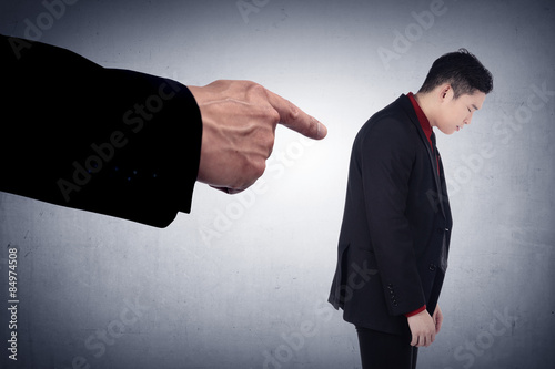 Obraz na plátně Concept of accused businessman with with fingers pointing