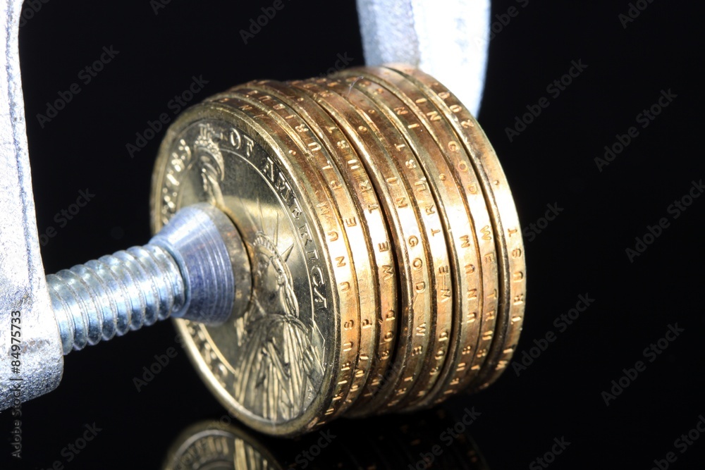 Budget Crisis US Currency Gold Coins in Vise Clamp Budget Crisis US Currency Gold Coins in Vise Clamp