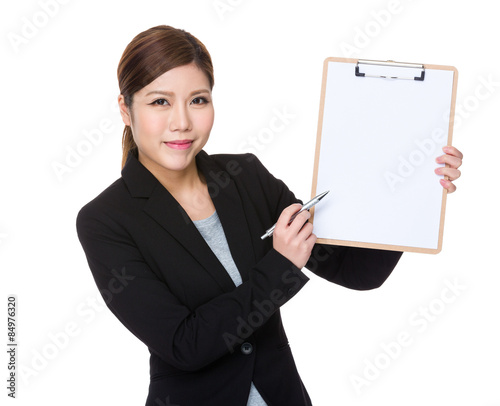 Asian businesswoman pen write on clipboard