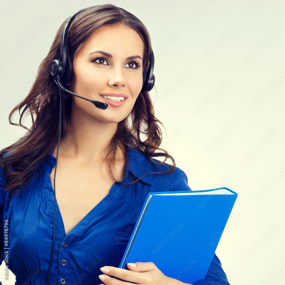 Support phone operator in headset with blue folder Support phone operator in headset with blue folder
