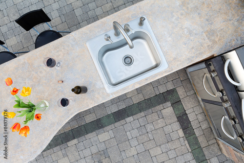 Exotic concrete counter top in an outdoor kitchen