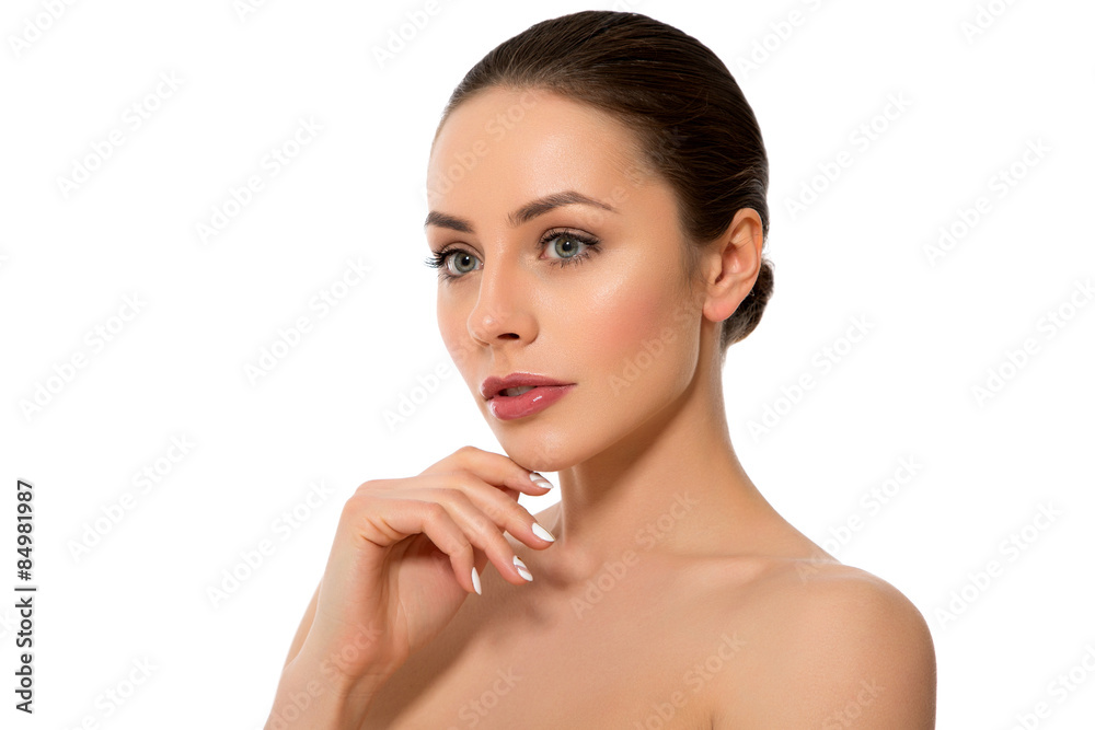 Naklejka premium Beautiful Young Woman with Clean Fresh Skin close up..