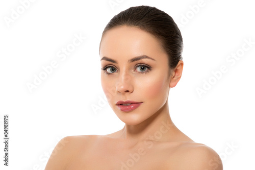 Beautiful Young Woman with Clean Fresh Skin close up..