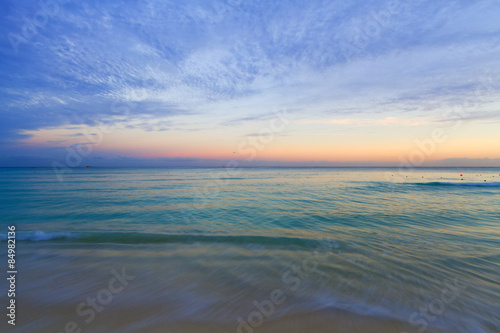 Sunset on the Caribbean beach. © andreiorlov