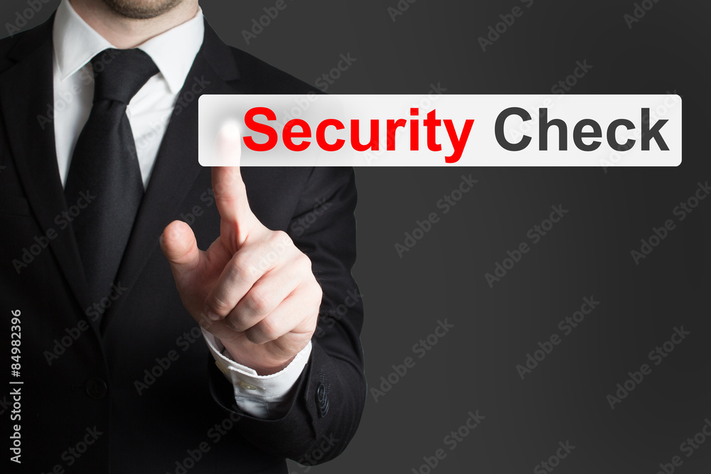 businessman pushing touchscreen security check businessman pushing touchscreen security check