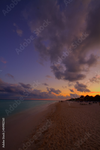 Sunset on the Caribbean beach. © andreiorlov
