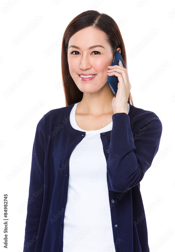 Asian woman talk to mobile phone Asian woman talk to mobile phone