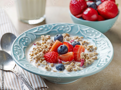 healthy breakfast, bowl of muesli with milk